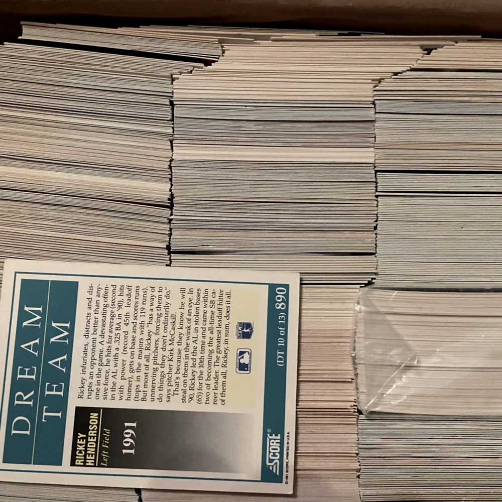 Hundred mixed Baseball, Hockey, Soccer cards from the 90’s in mint condition.